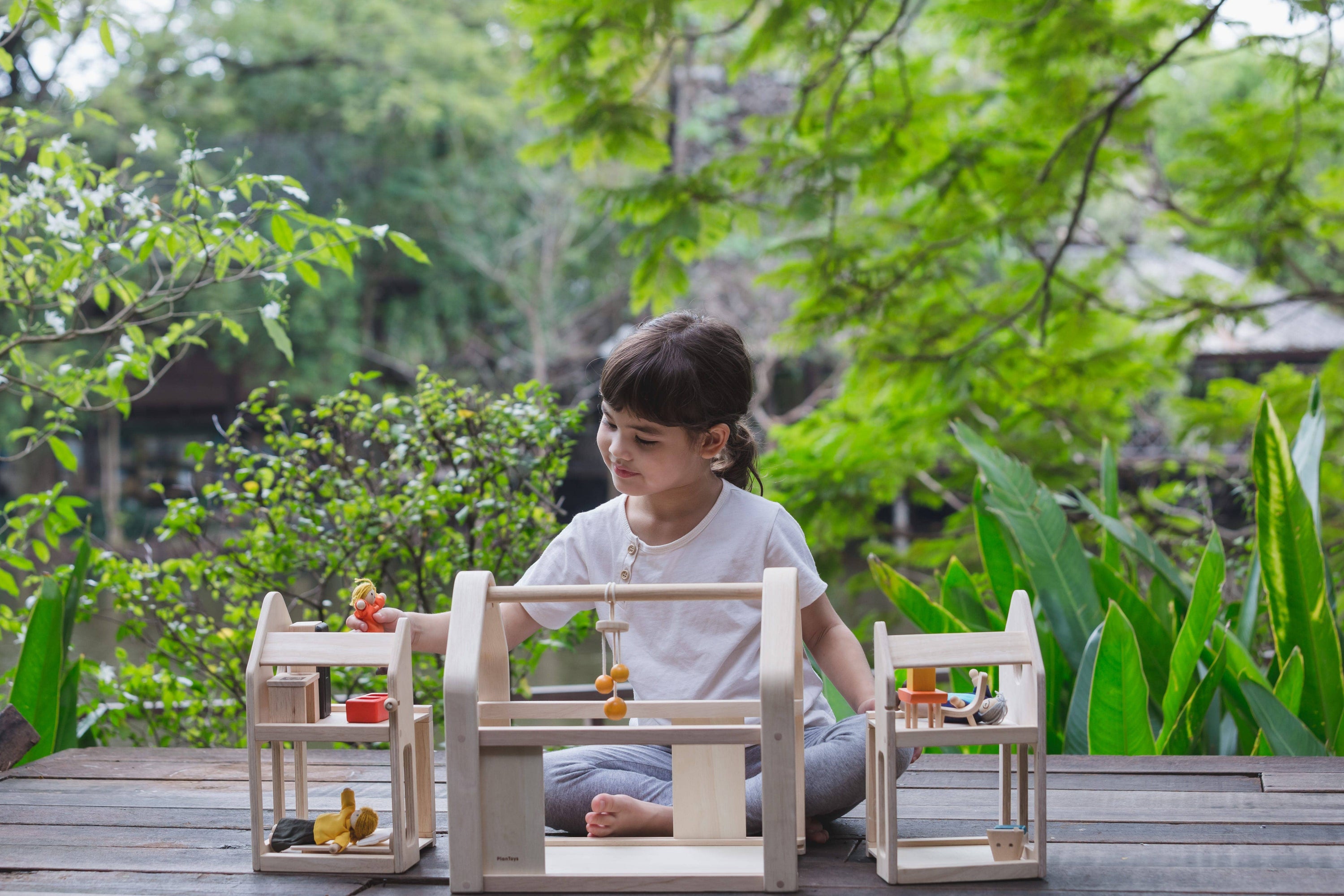 PLAN TOYS - Slide N Go Dollhouse
