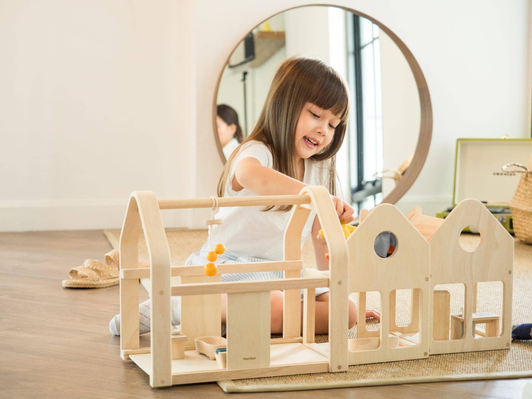 PLAN TOYS - Slide N Go Dollhouse